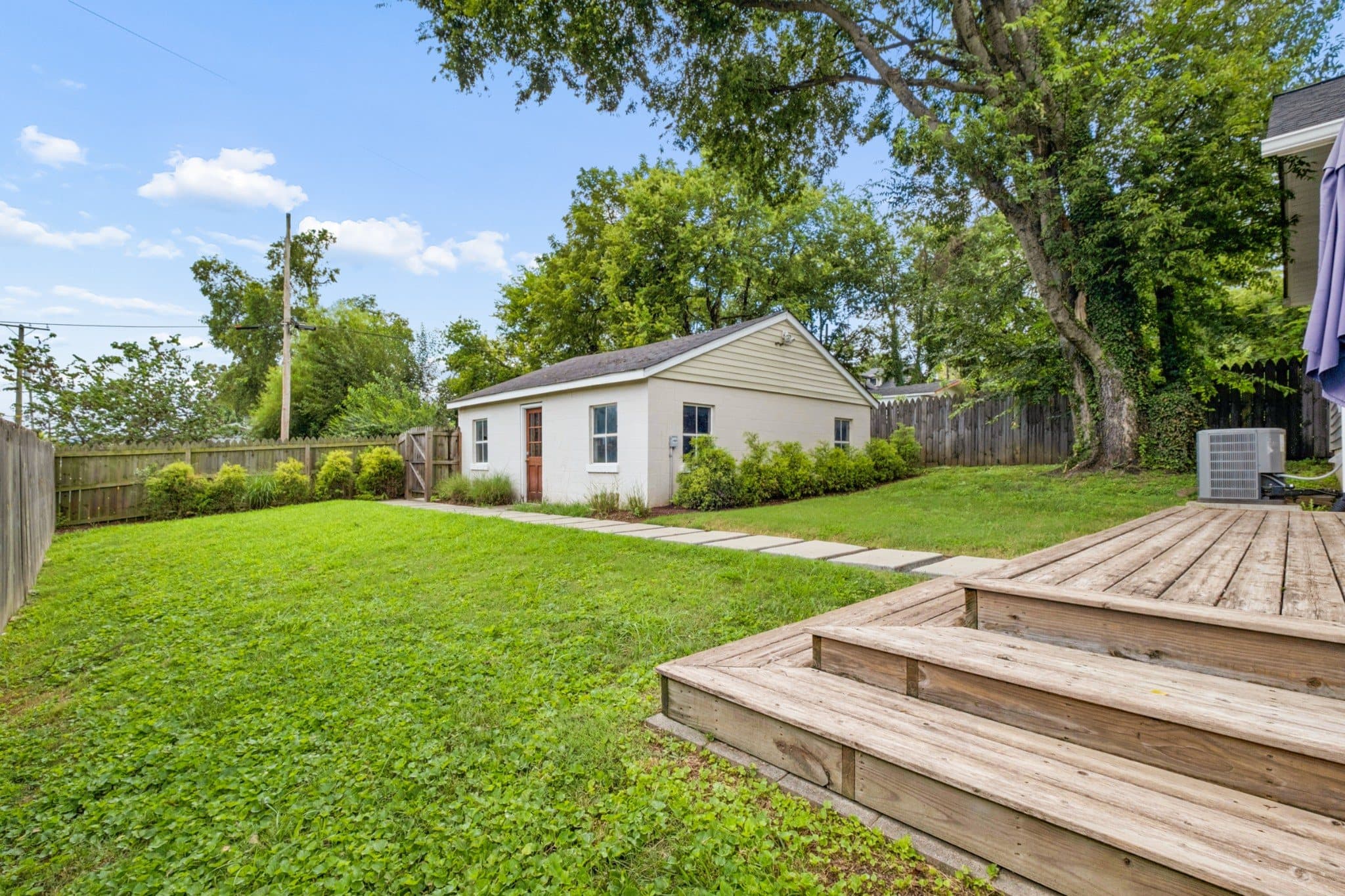 Fenced back yard and detached two car garage at 1001 Caldwell Ave in 12 South Nashville