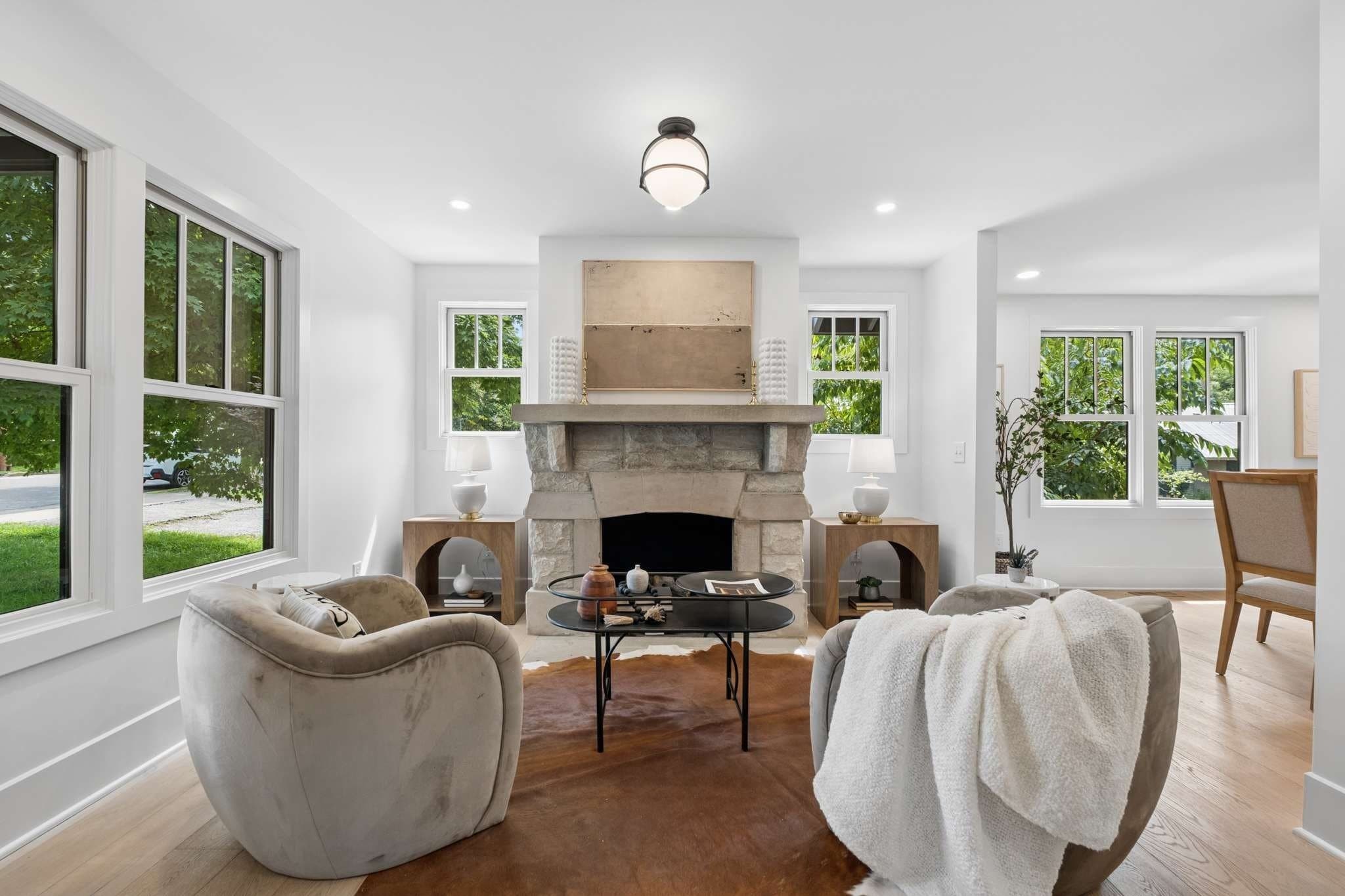 Living room with stone fireplace at 1101 Paris Avenue, 12 South Nashville