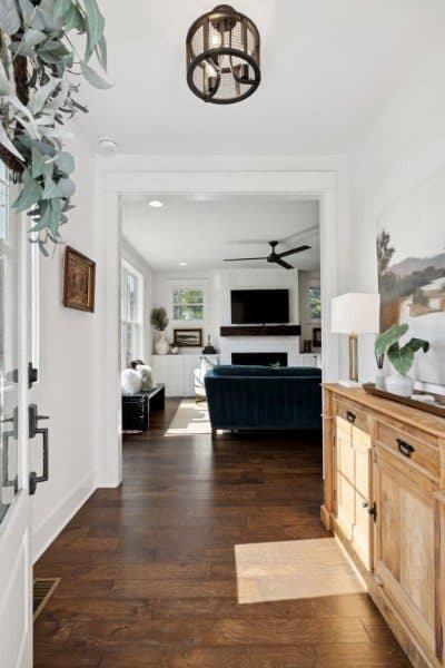 Living room with hardwood floors, fireplace, and built-ins at 2229A 11th Avenue South, 12 South Nashville