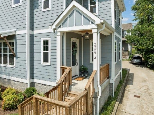 Covered front porch with wood steps and house number 2229 A at 2229A 11th Avenue South, 12 South Nashville