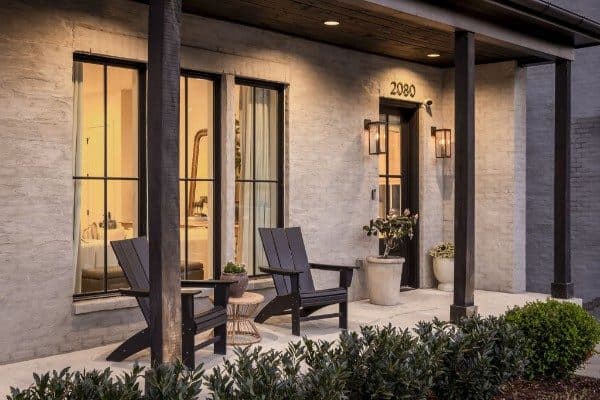 Covered front porch with seating and the house number at 2080 12th Avenue South, 12 South Nashville