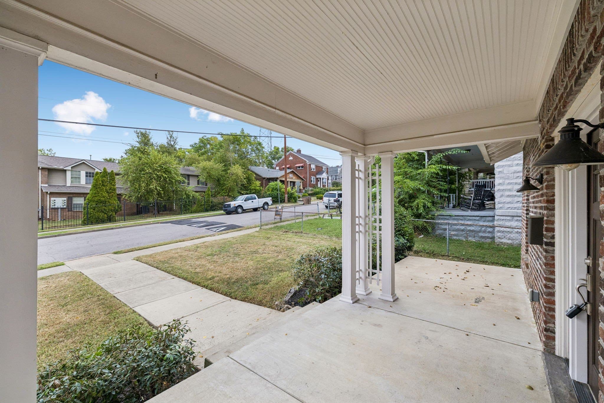 Covered front porch looking toward the street at 1509 Ashwood Avenue in the Belmont area near 12 South Nashville