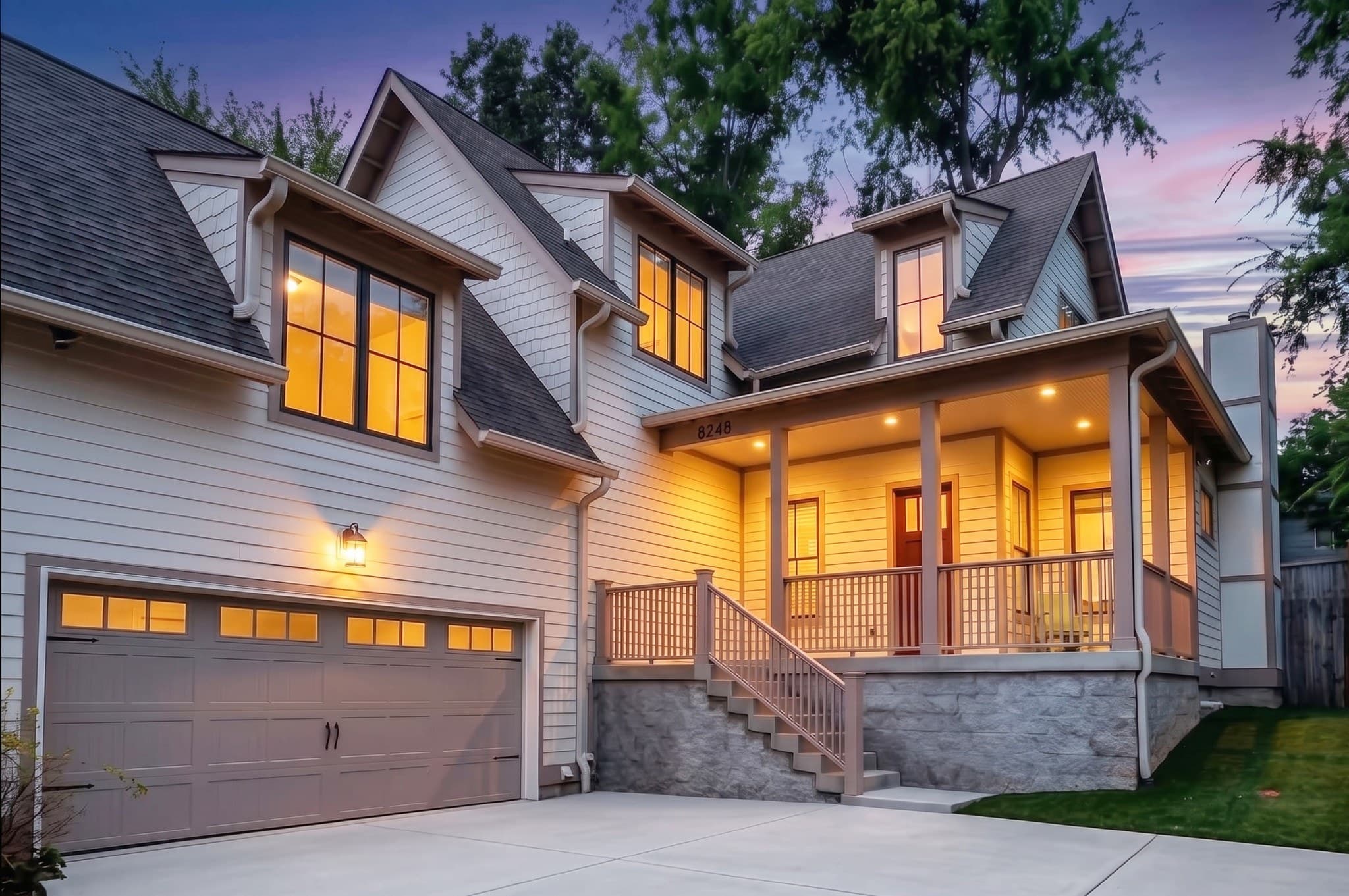 Front exterior of the Craftsman home with covered porch and two car garage at 824B Horner Avenue, one of the 12 South homes for sale in Nashville
