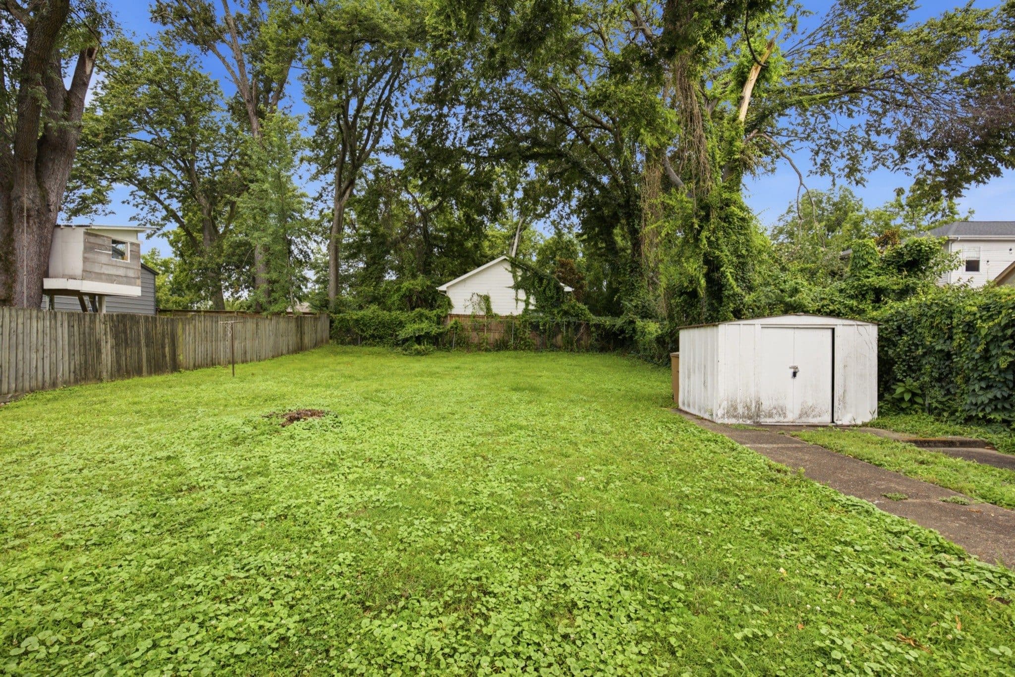 Fenced backyard lawn and storage shed at 2305 Cisco Street, 12 South Nashville