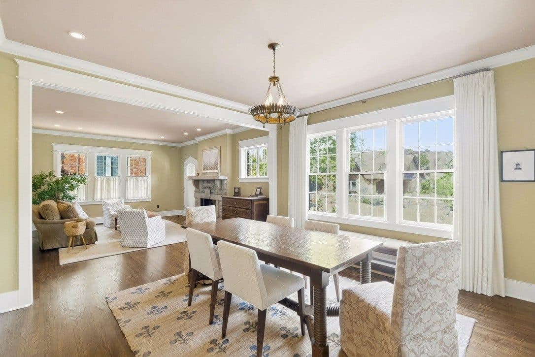 Dining room with a long table and a wall of windows at 1405 Clayton Avenue, 12 South Nashville