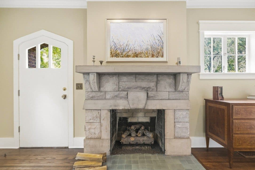 Stone fireplace beside an arched door at 1405 Clayton Avenue, 12 South Nashville