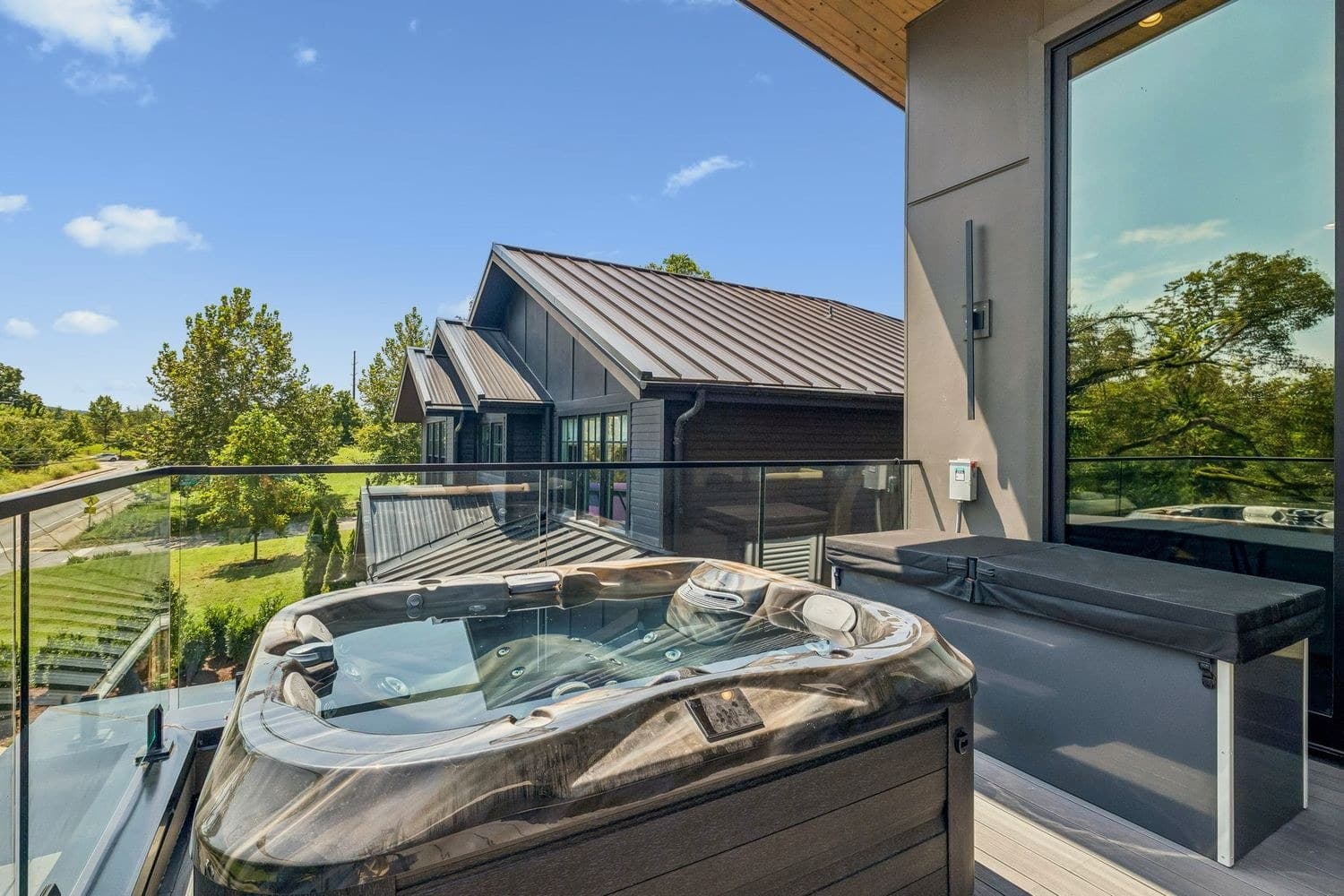 Rooftop hot tub with open sky and tree views at 3205B Granny White Pike in the walkable 12 South Nashville neighborhood