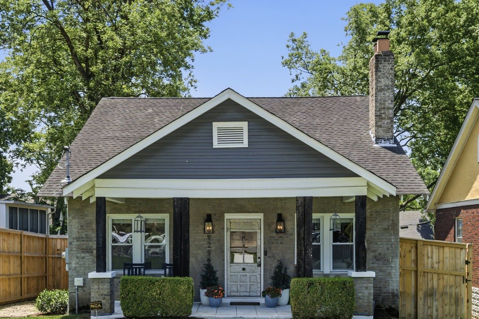 Gray brick cottage at 929 Lawrence Avenue in 12 South, Nashville