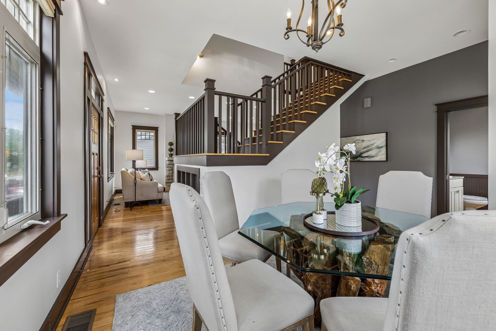 Dining area beside the staircase with hardwood floors at 925 Wedgewood Avenue, 12 South Nashville